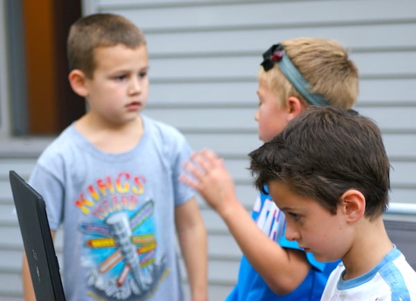 Kid running laser tag game